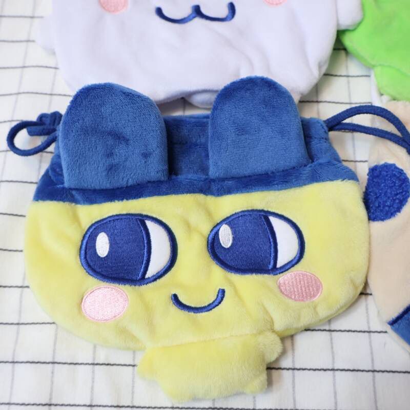 حقيبة تخزين جديدة بتصميم تاماغ - مراجعة Bandai Model Tamagotchi وسعره